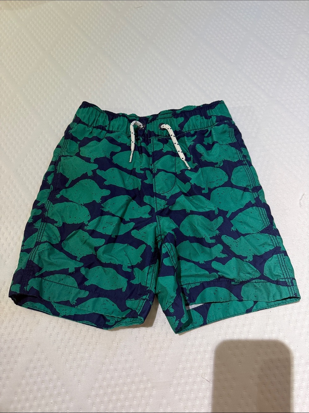 Vineyard Vines Kids Swim Trunks in Green and Navy Fish Print